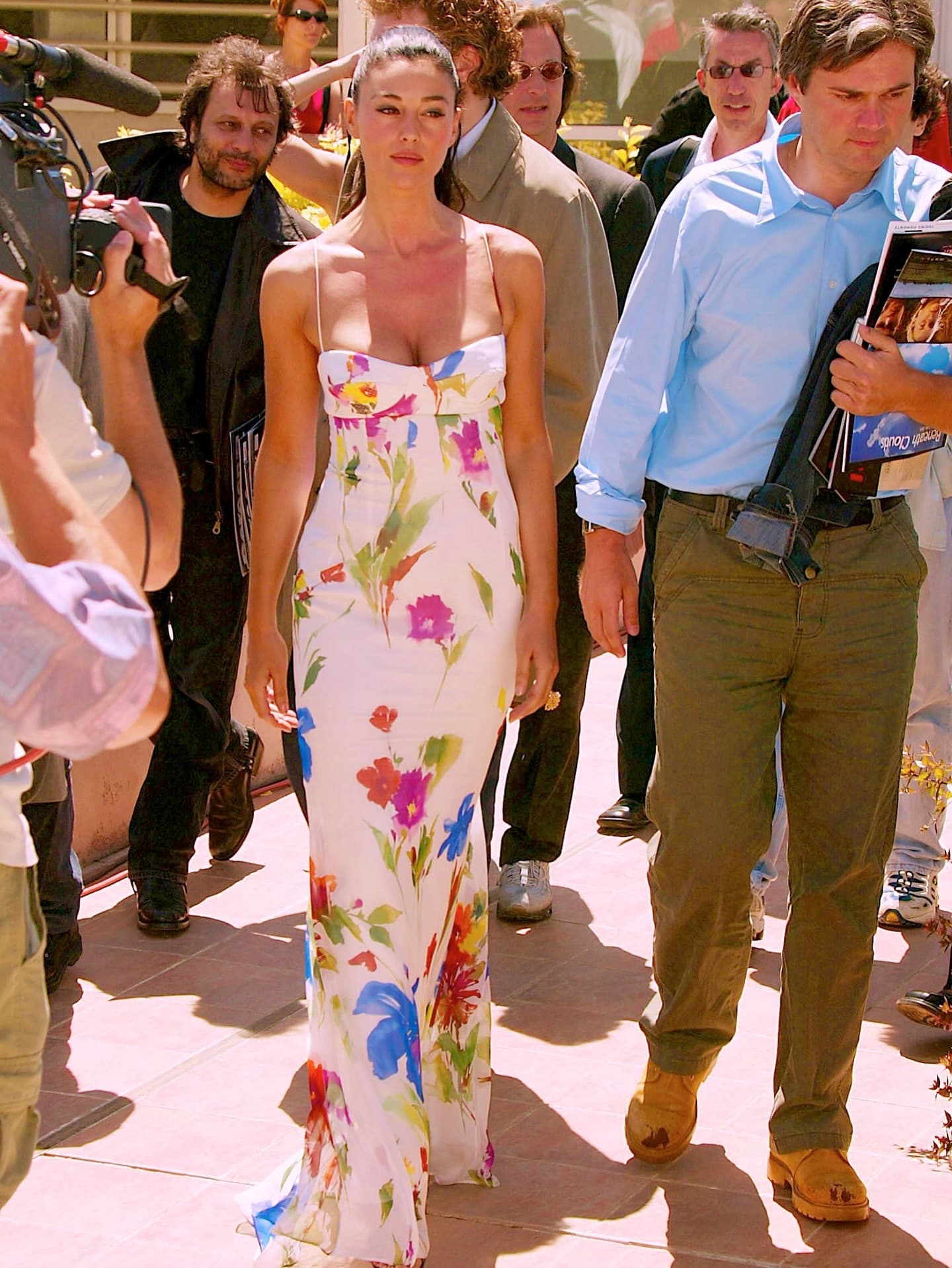 With her ponytail worn high and a light tan, Bellucci faced photographers at the Cannes photo call.