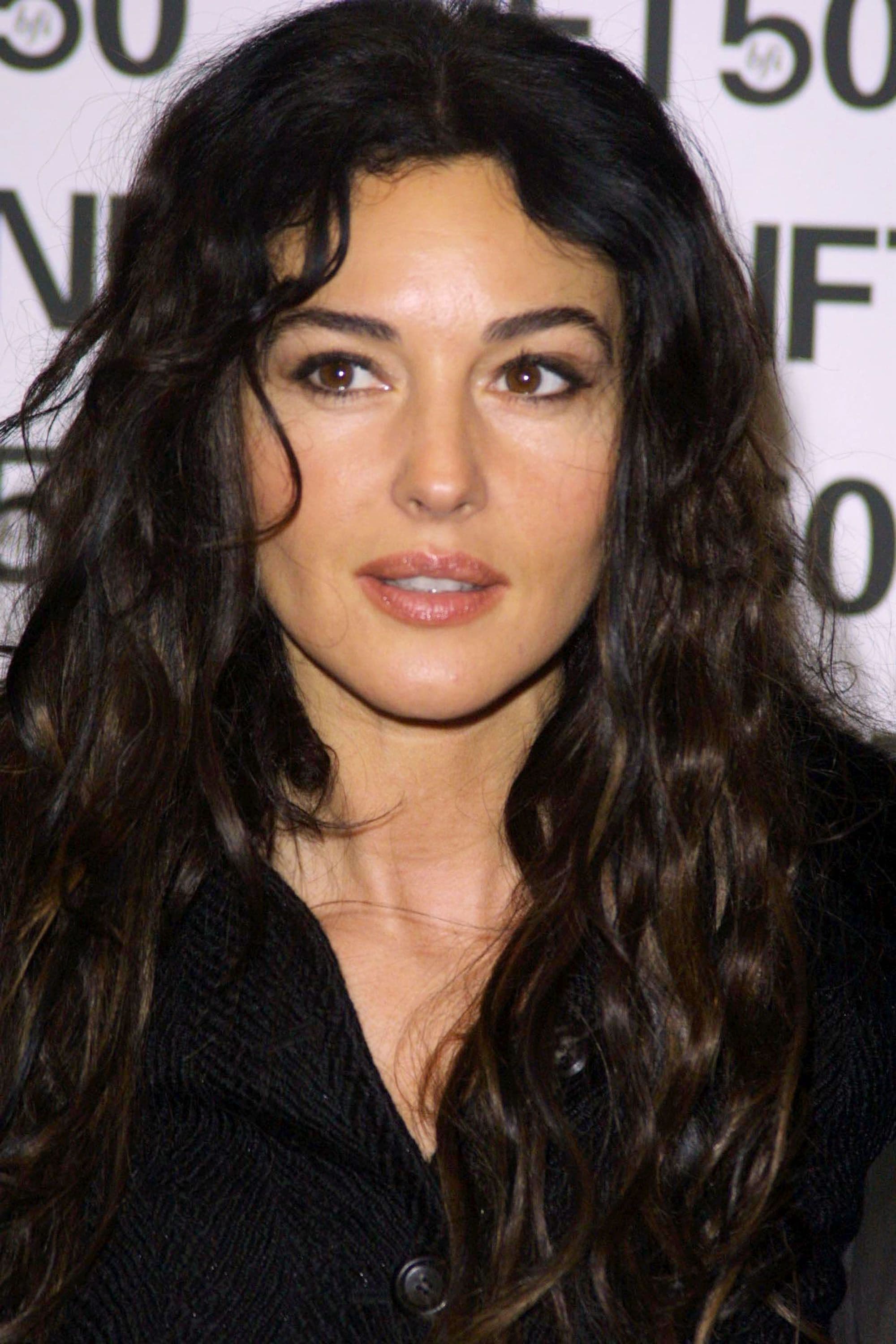 Monica Bellucci attends an Irreversible screening at London's National Film Theatre with sleek hair and softly smoky eyes.