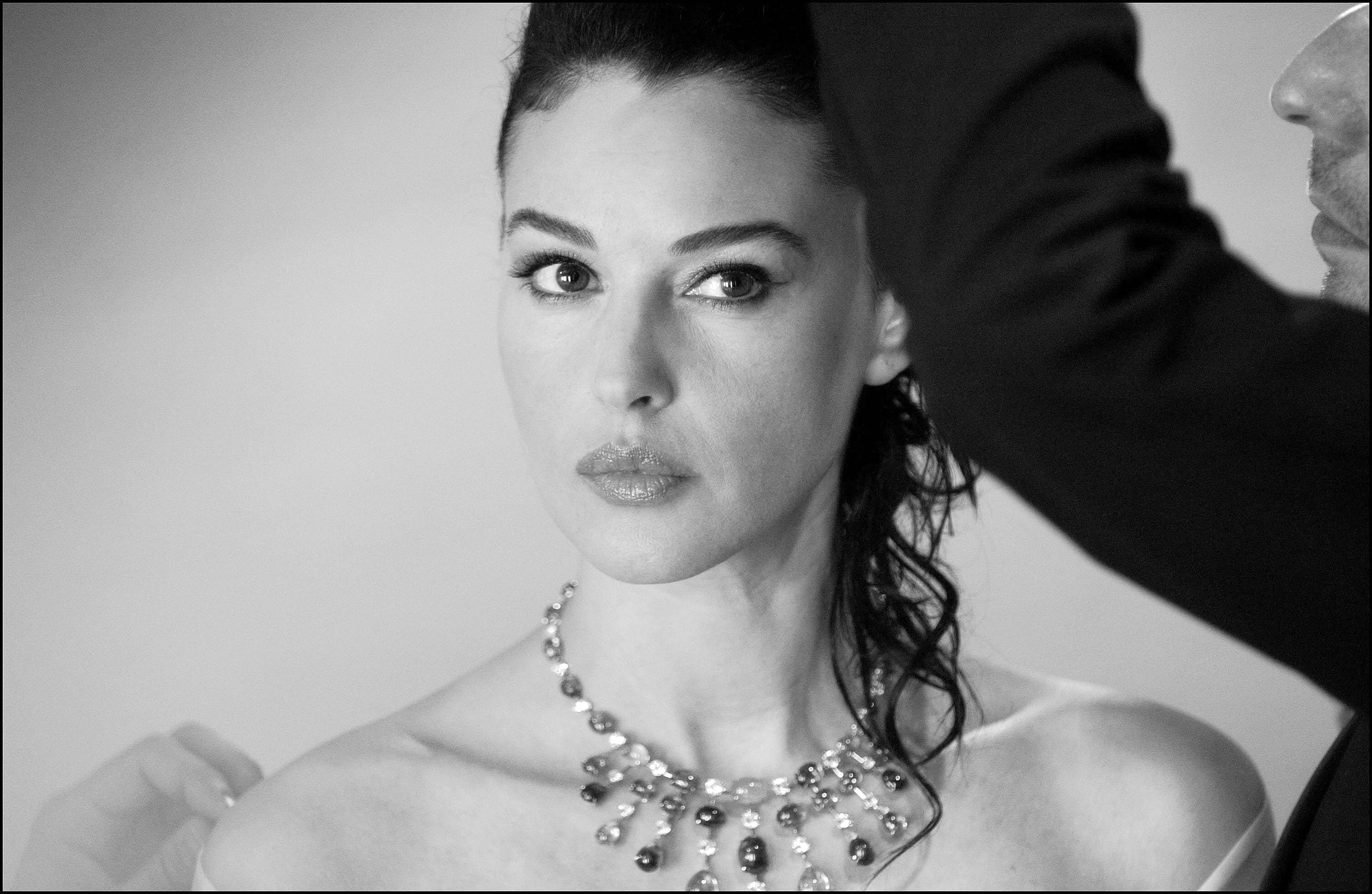 Monica Bellucci receives a final hair and makeup touch-up before the closing ceremony of the 56th Cannes Film Festival.