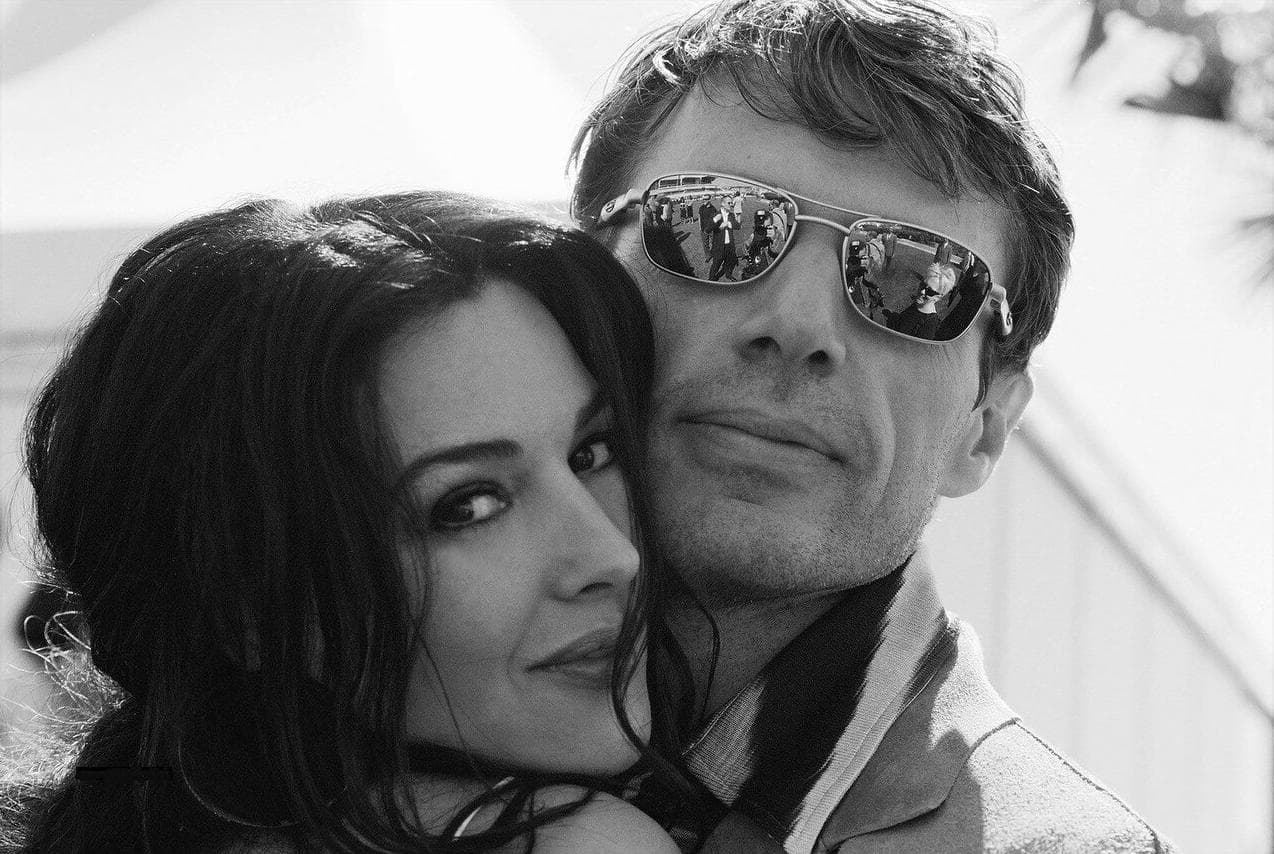 Bellucci shares a relaxed moment away from the ceremony during the 2003 festival.
