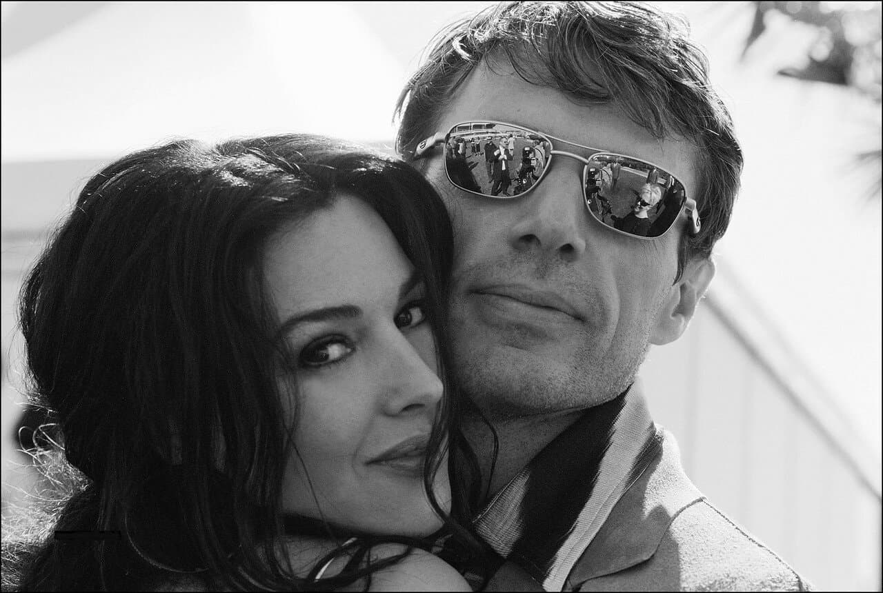 Bellucci shares a relaxed moment away from the ceremony during the 2003 festival.