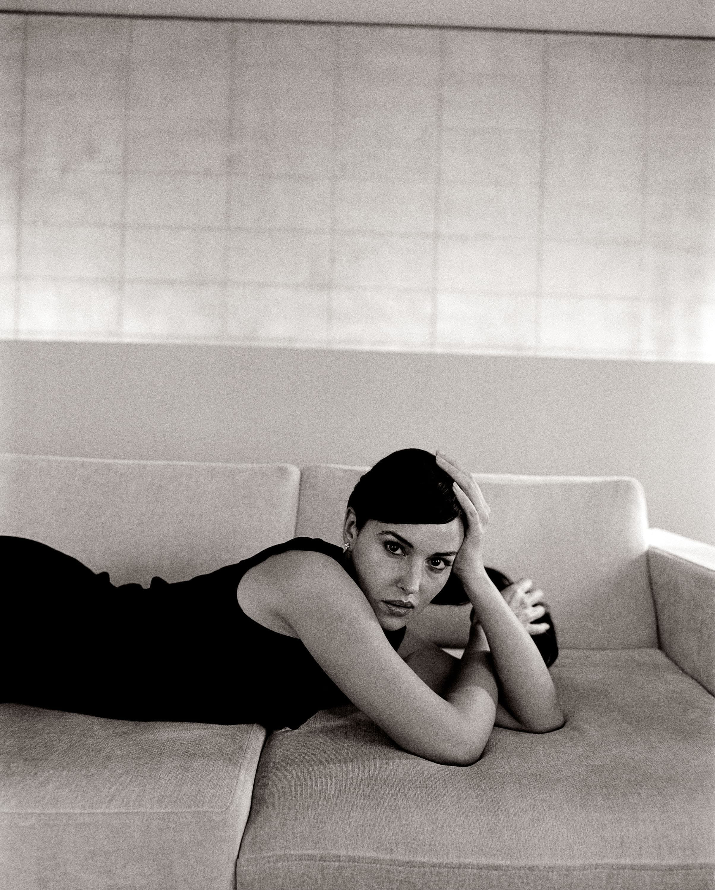 In 2004, while pregnant with her daughter Deva, Bellucci posed nude for the Italian Vanity Fair in protest against an Italian law that restricts the provision of fertility treatment to heterosexual couples and excludes single women or same-sex couples, restricts surrogacy and research using human embryos, forbids sperm and egg donation, and limits the number of embryos created with in-vitro techniques to three.