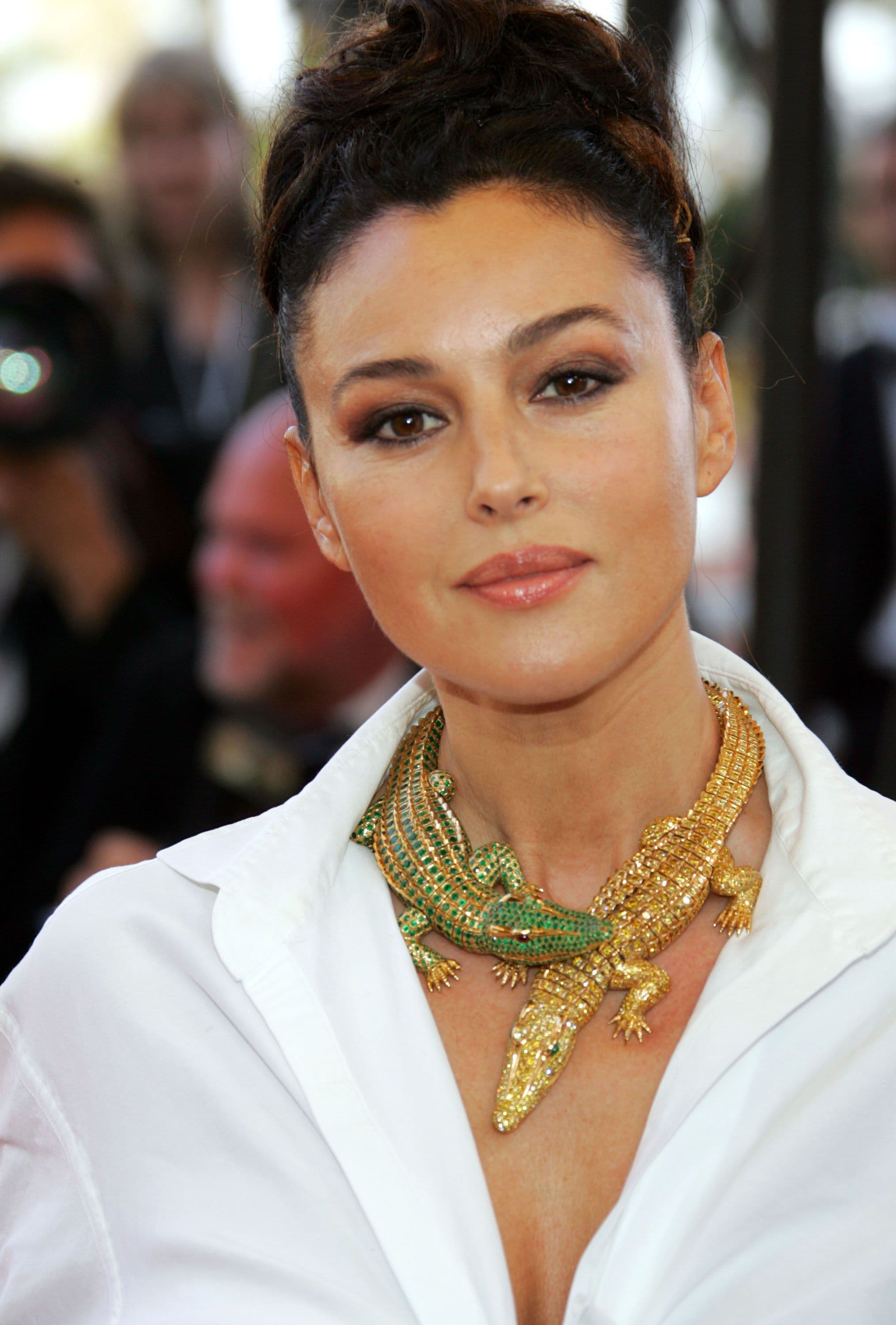 Monica Bellucci wears a spectacular jeweled crocodile necklace at Cannes in 2006.