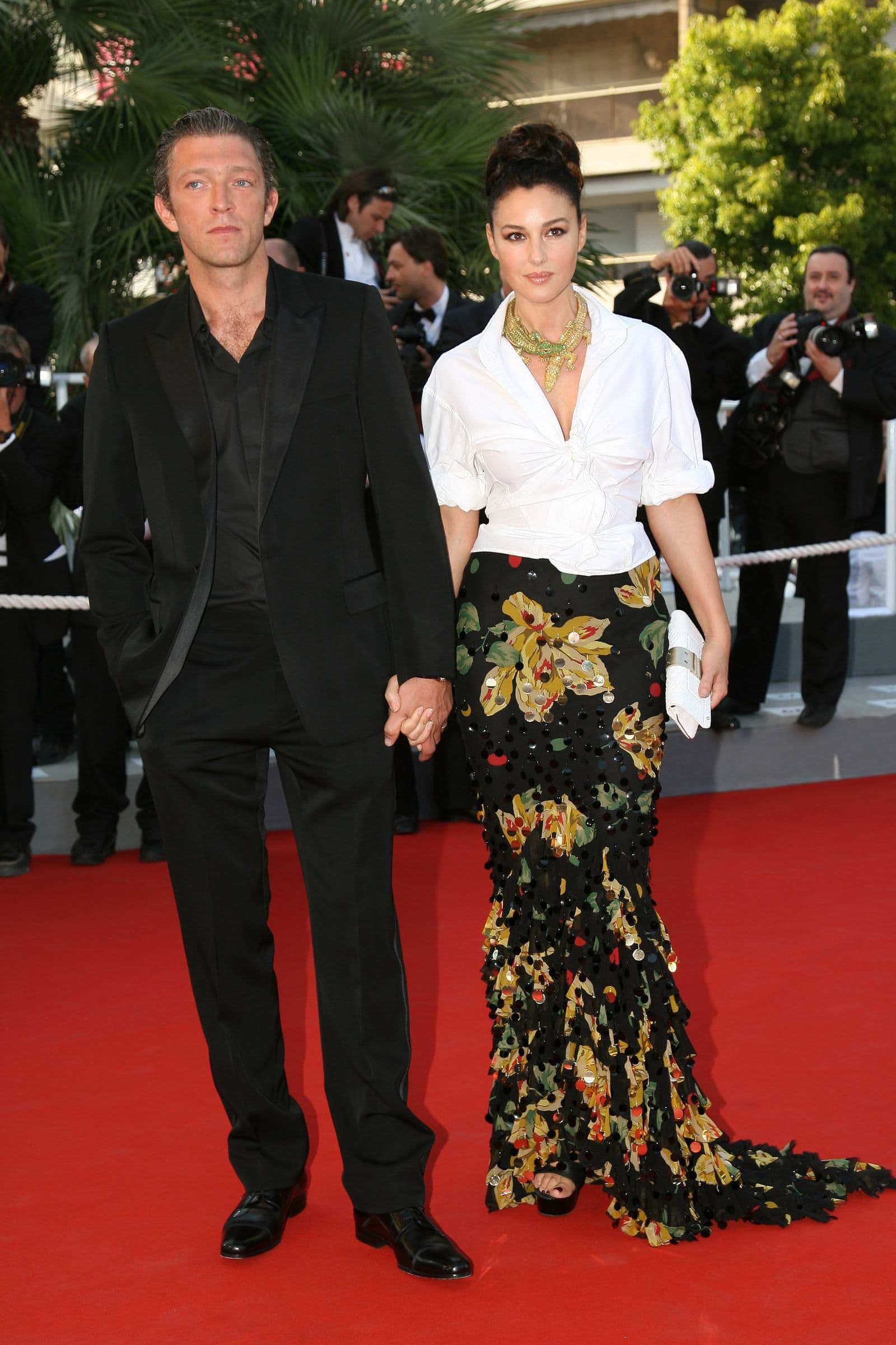 Monica Bellucci and Vincent Cassel attend the Indigènes premiere at Cannes in 2006.