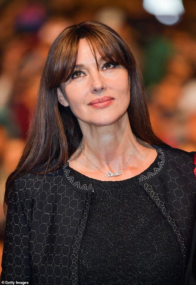 Her age-defying features were enhanced with a simple slick of blush-infused make-up, complementing her sleek fringed brunette mane. The Italian actress wowed as she dressed her statuesque figure in a chic black dress which she teamed with a matching cropped jacket All eyes were on Monica as she posed away on the red carpet in her gorgeous attire. The beauty showcased her figure to perfection in the slinky black gown, which effortlessly caught the light.