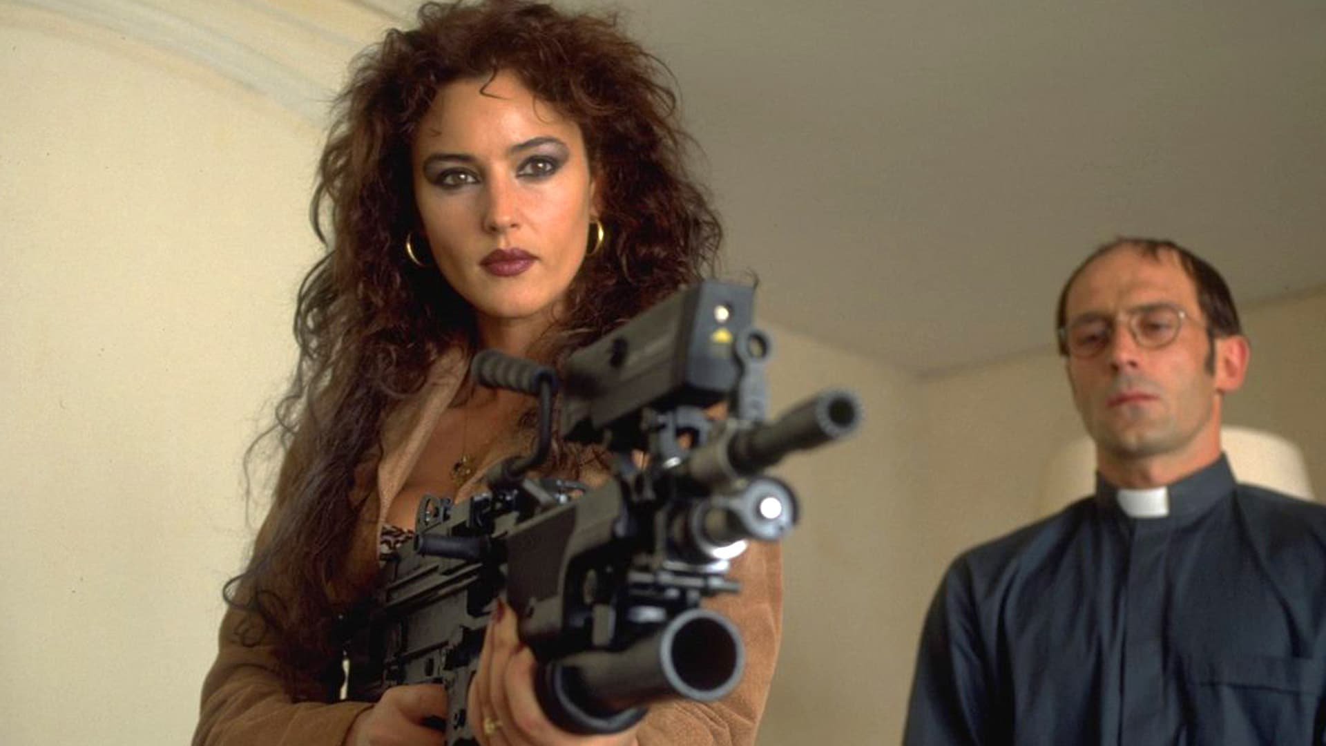 A crook known as Dobermann (Vincent Cassel) has a soft spot for guns, and he loves using them -- especially to rob banks. Flanked by his deaf but equally violent lover Nat the Gipsy (Monica Bellucci), plus a brutal and bizarre pack of fellow thieves, Dobermann pulls off a tricky job that results in the death of police officers. After the heist, the group is pursued by the rogue cop Cristini (Tcheky Karyo), who spits bile and will stop at nothing to take down the gang.