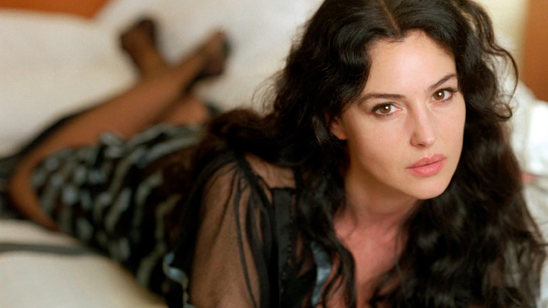 Monica Bellucci as Maddalena Scordia, known as Malèna.